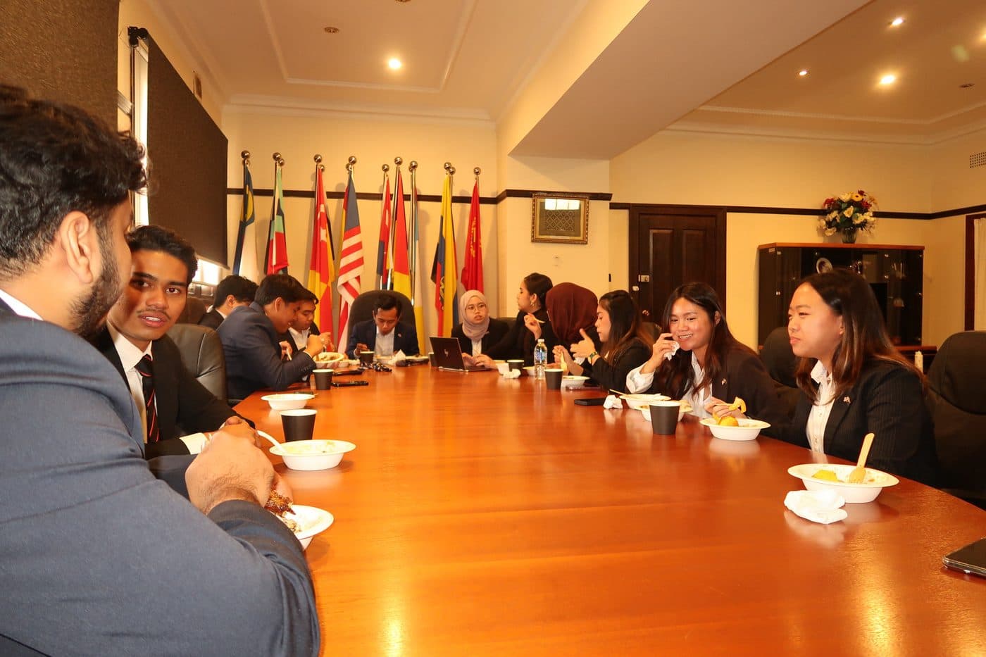 MASCA NSW students around the boardroom table at the Consulate of Malaysia in Sydney